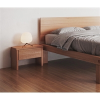 Comodino in legno massello di Okumé Petrosino con cassetto